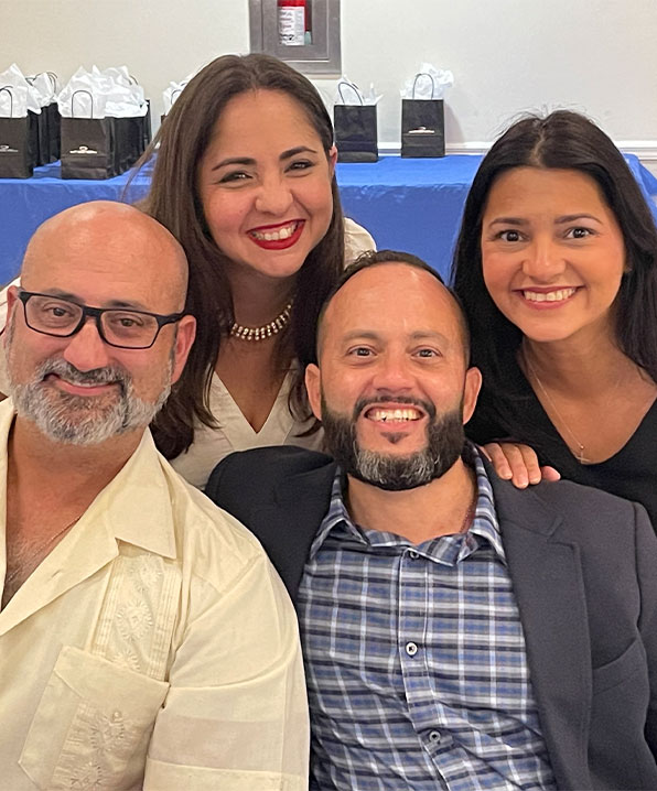 Brother Knights Rick and Manny Piedra smiling at Casino Night 2023 – KofC Council 14730 community event.